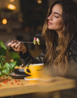 A woman is enjoying a meal