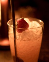 A glass with ice and strawberry